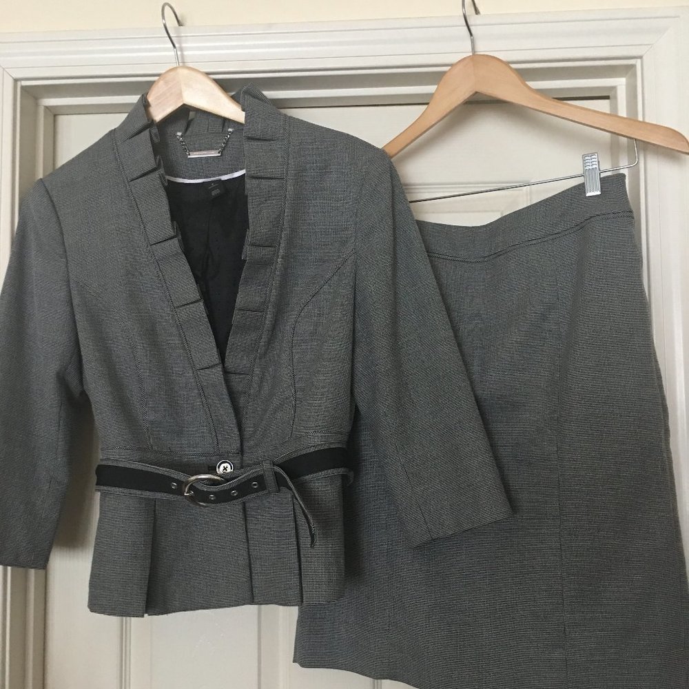 Fun and flirty suit with reversible belt.